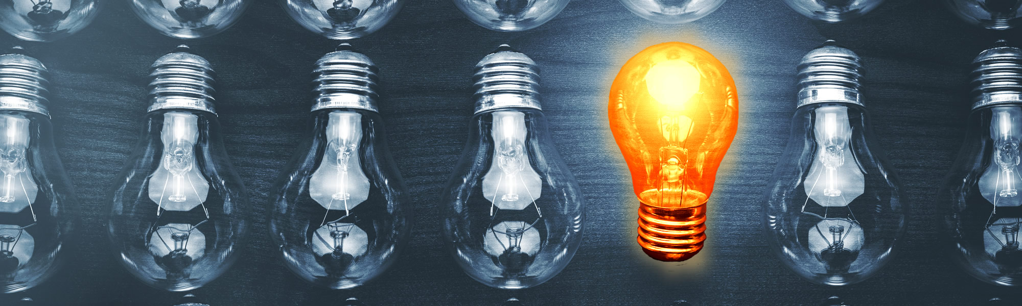 Mowat Mackie & Anderson Accounting Services - rows of lightbulbs with one lightbulb on v6